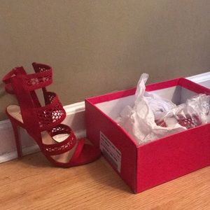 BRAND NEW SHOEDAZZLE RED HEELS